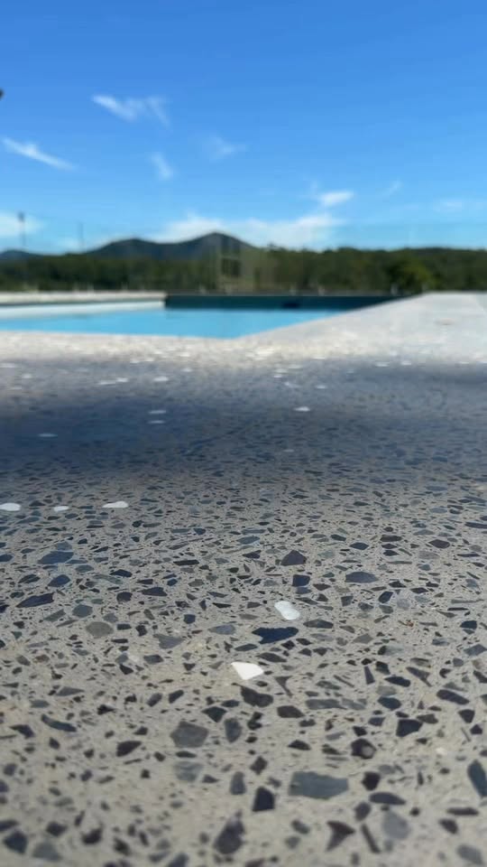 Honed concrete close-up — Boral feature mix, large stone, popular choice for driveways and alfresco